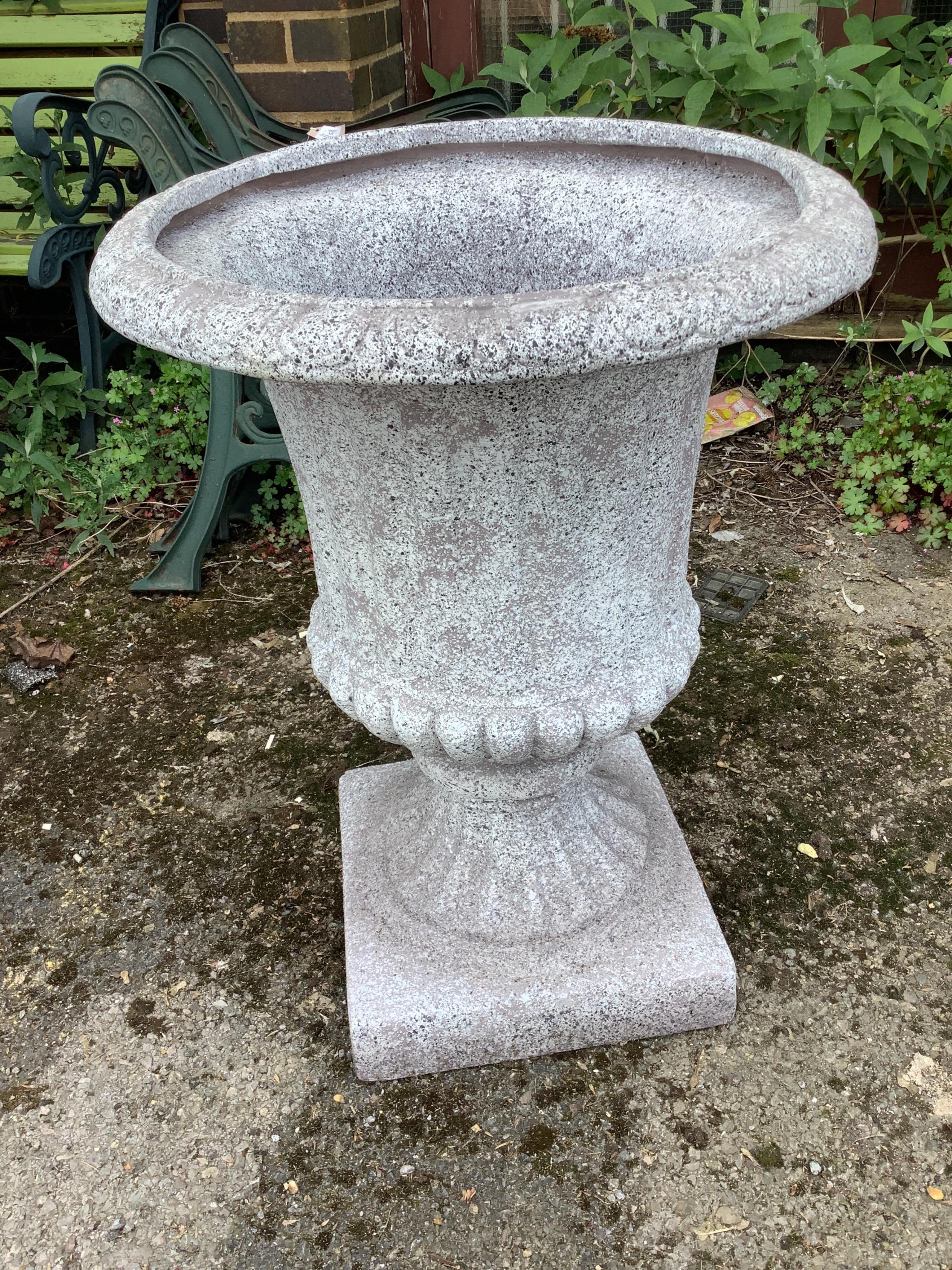 A pair of circular Fibreclay campana garden urns, diameter 54cm, height 72cm